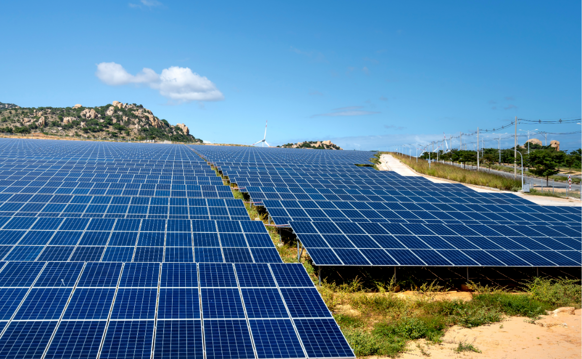 A solar farm array in a rural setting.