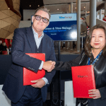The MoU was exchanged by Scott Poulter, CEO of Pacific Green (Left), and Helena Li, President of Trinasolar (Right)